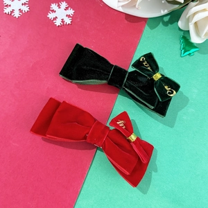 Elegantes lazos para el pelo de terciopelo rojo y verde con bordado dorado navideño