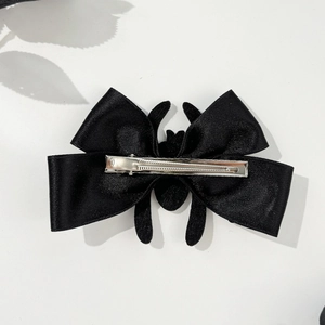 Gothic black spider bow hair clip with satin ribbon and durable metal duckbill clip