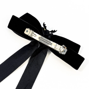 Eleganter schwarzer Samt-Haarclip mit Schleife, langen Bändern und Metall-Federclip