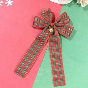 Weihnachtliche Haarspange mit roter Karoschleife, goldener Glocke und langen Bändern
