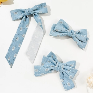 Set di tre fermagli per capelli con fiocco in denim azzurro e paillettes da donna