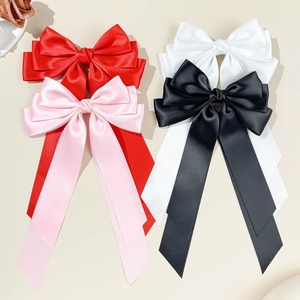 Three-layer satin bow hair clips with long streamers in red, pink, white, and black colors