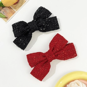 Elegant tweed bow hair clips with sequins in black and red for a vintage French style