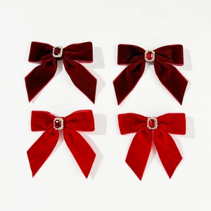 Elegant red velvet bow hair clips with square ruby center and rhinestone edging