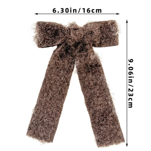 Detailed size specifications for the brown plush bow hair clip with measurements in cm and inch