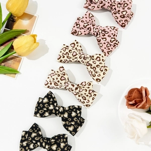 Set of 6 leopard and heart print bow hair clips in pink beige and black corduroy fabric