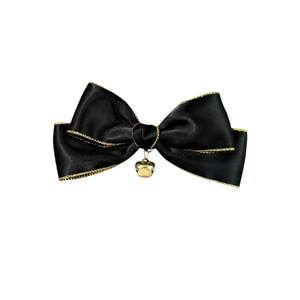 Elegant black satin bow hair clip with gold trim and a metallic bell accent