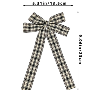 Detail showing dimensions of plaid bow hair clip with ribbons 13.5cm width and 23cm length