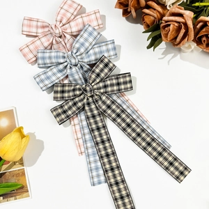 Japanese style plaid bow hair clips in pink, blue and brown with long hanging ribbons