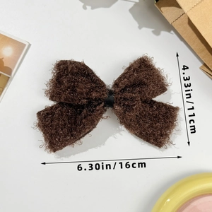 Spécifications détaillées de taille pour la grande barrette noeud en peluche marron