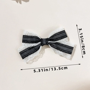 Detailed view of lace bow hair clip showing dimensions 13.5cm length and 8cm width