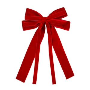 Elegant red velvet double bow hair clip with long streamers on a white background