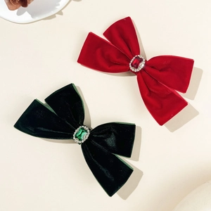 Elegant velvet bow hair clips with faux gemstone and rhinestone accents for women