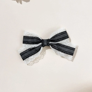 Sweet lace and striped ribbon bow hair clip in classic black and white contrast