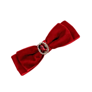 Elegant red velvet double bow hair clip with a large ruby rhinestone and crystal halo