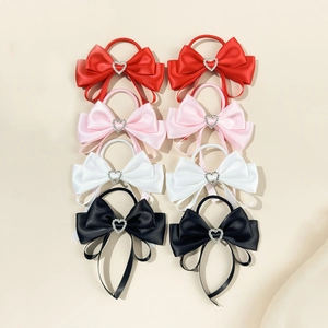 Satin bow hair scrunchies with heart rhinestones and long ribbons in four colors