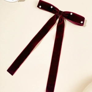 Elegant deep burgundy velvet bow hair clip with white pearls and long ribbon tassels