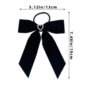 Detail view of velvet bow hair tie with rhinestone heart and size dimensions in inches