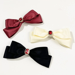 Elegant bow hair clips with red crystals and rhinestones in burgundy, beige and black