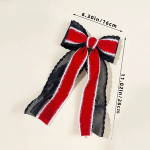 Detailed dimensions of red velvet and black mesh bow hair clip showing 16cm width size