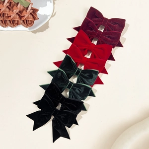 Elegant velvet bow hair clips in multiple colors for a vintage autumn and winter aesthetic