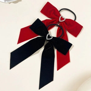 Velvet bow hair ties with hollow rhinestone heart detailing in red and black colors