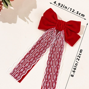 Close-up of red velvet bow hair clip with floral lace streamers and size dimensions