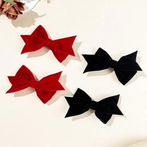 Set of four vintage velvet bow hair clips in red and black colors for girls