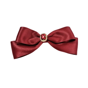 Elegant wine red satin bow hair clip with a rectangular gemstone and rhinestones