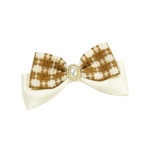 Retro plaid tweed bow hair clip with large faux pearl accent on white background