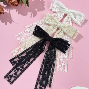 Eleganti fermagli per capelli in pizzo con fiocco e nastro in nero, crema e bianco