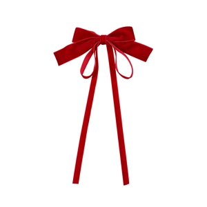 Vintage red velvet bow hair clip with long ribbons for elegant women's hairstyling