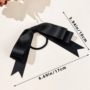 Detailed view of black satin triple-layer bow hair tie with size measurements 10x17cm