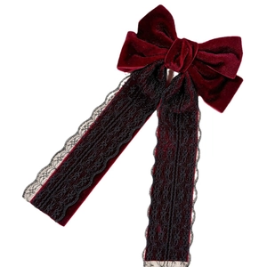 Elegant burgundy velvet bow hair clip with black lace ribbons in a vintage style