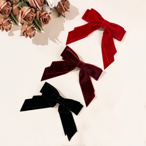 Three-piece set of elegant double-layered velvet bow hair clips in red, burgundy, and black