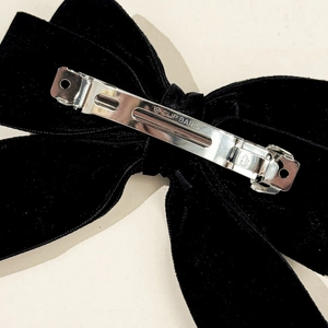 French vintage black velvet bow hair clip with a silver metal spring clip back