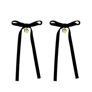 Pair of black velvet bow hair clips with golden bells and long ribbons for girls