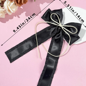 Detailed dimensions of the black satin ballet bow hair clip showing 24cm length