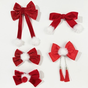 Chinese style red bow hair clip set with white pom-poms and festive tassels