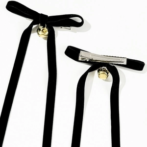 Sweet Christmas velvet hair clips with golden bells and long black ribbon streamers