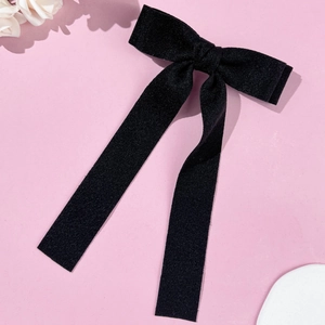 Elegant black velvet hair clip with long ribbon and sparkling texture for women's hairstyle