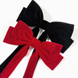 Large velvet bow hair clips with long streamers in red and black vintage princess style