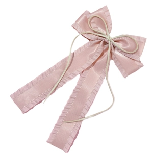 Elegant pink satin ballet-style bow hair clip with ruffle edges and long flowing ribbons