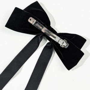 Elegant large black velvet bow hair clip with long ribbons and metal spring fastener