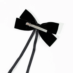 Elegant black velvet double bow hair clip with long streamers and silver duckbill clip