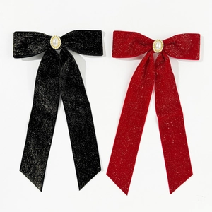 Elegant red and black velvet bow hair clips with pearls and shimmering metallic silk