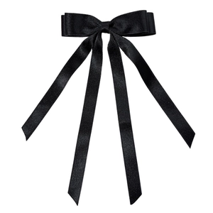Elegant black satin ribbon bow hair clip with long streamers for a minimalist look