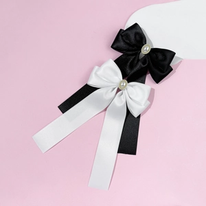 Barrettes à cheveux élégantes avec nœuds en satin, perles et strass en noir et blanc