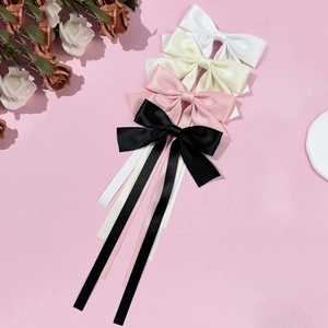 Elegant satin bow hair clips with long streamers in white, beige, pink, and black colors