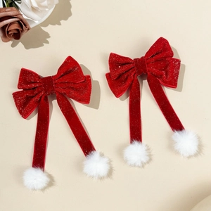Red velvet bow hair clips with white pom poms and long ribbons for New Year style